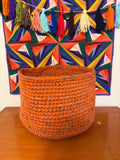 Large orange and gray crocheted basket