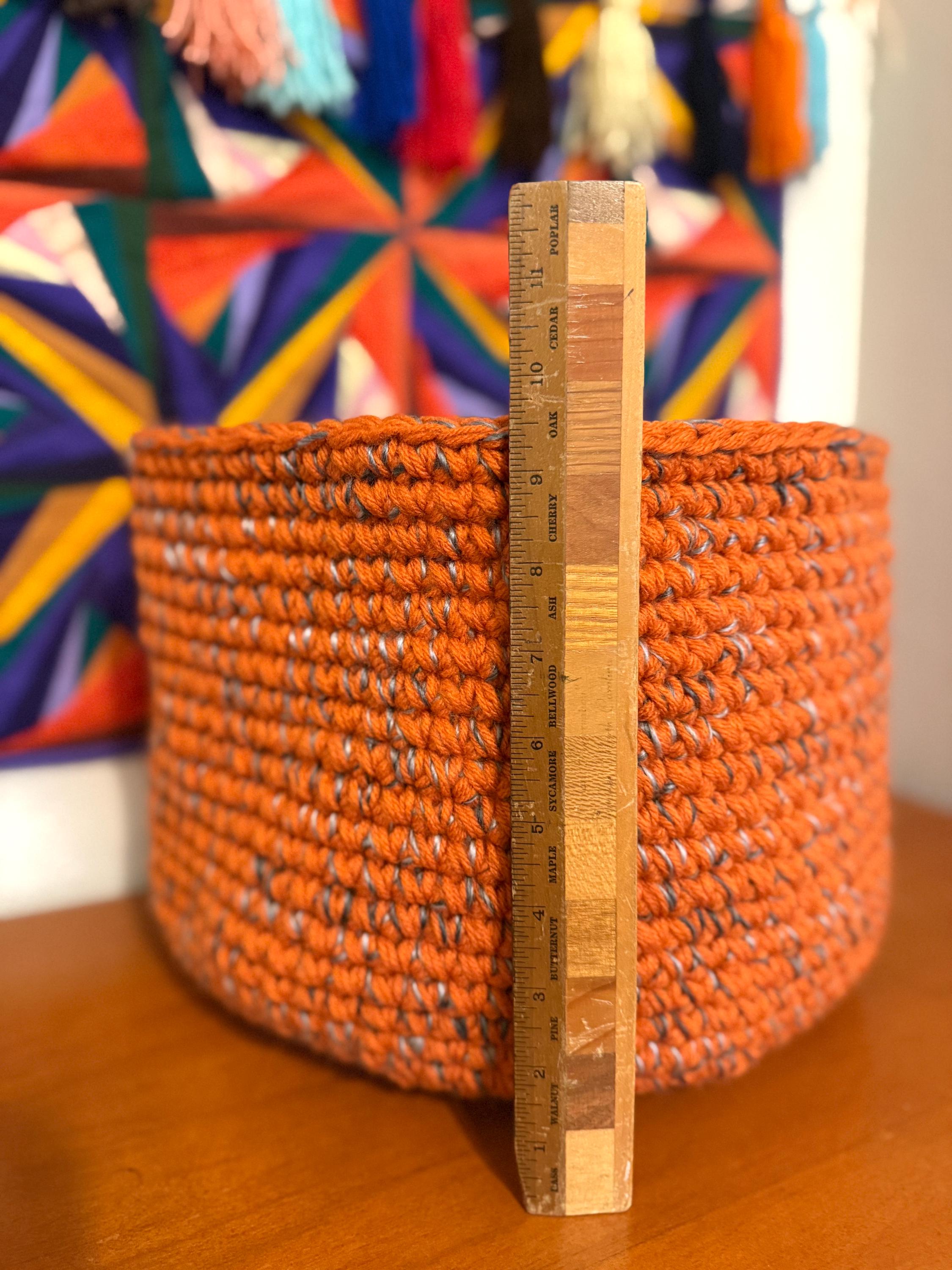 Large orange and gray crocheted basket